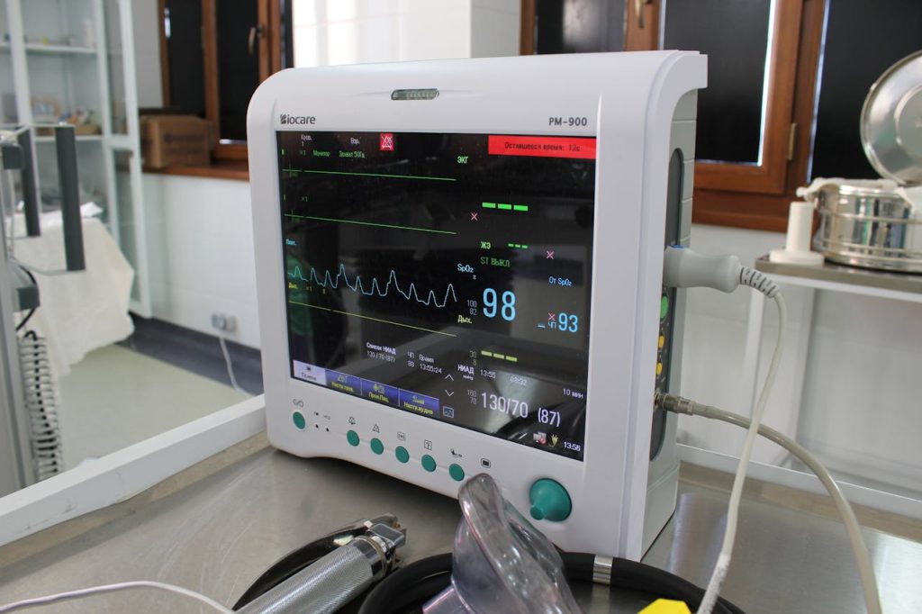 Crafting Captivating Headlines: Your awesome post title goes here Close-up of an advanced medical monitor displaying ECG data in a clinic.
